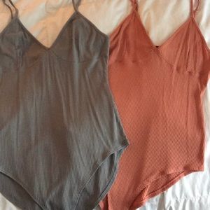 Two bodysuits